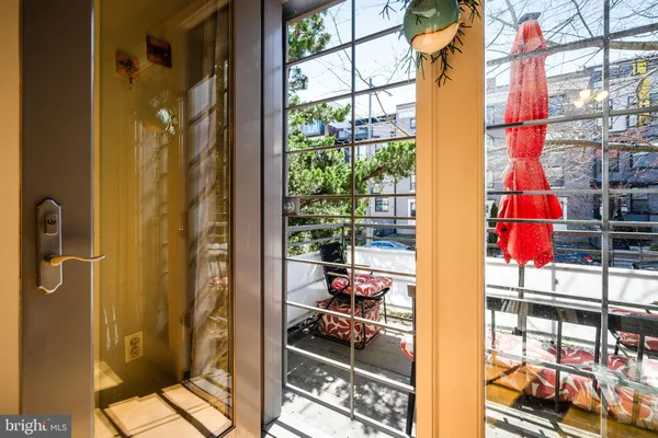 a view of a bathroom with a glass door