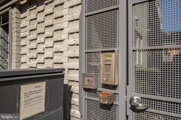 a front view of a building with a yard