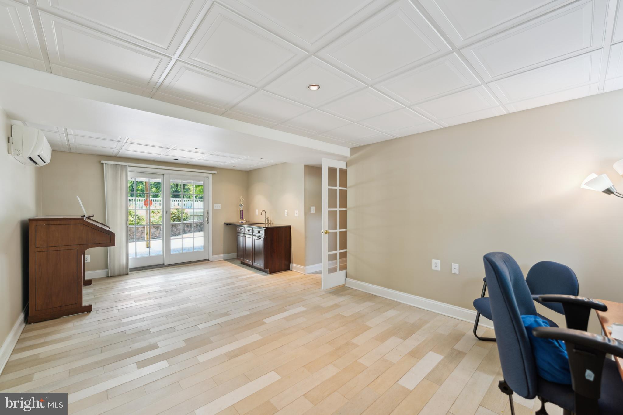 8235 Old Mill Road Pasadena, MD 21122 - Photo 22 of 45 Bonus Room w/sink & walk out to patio