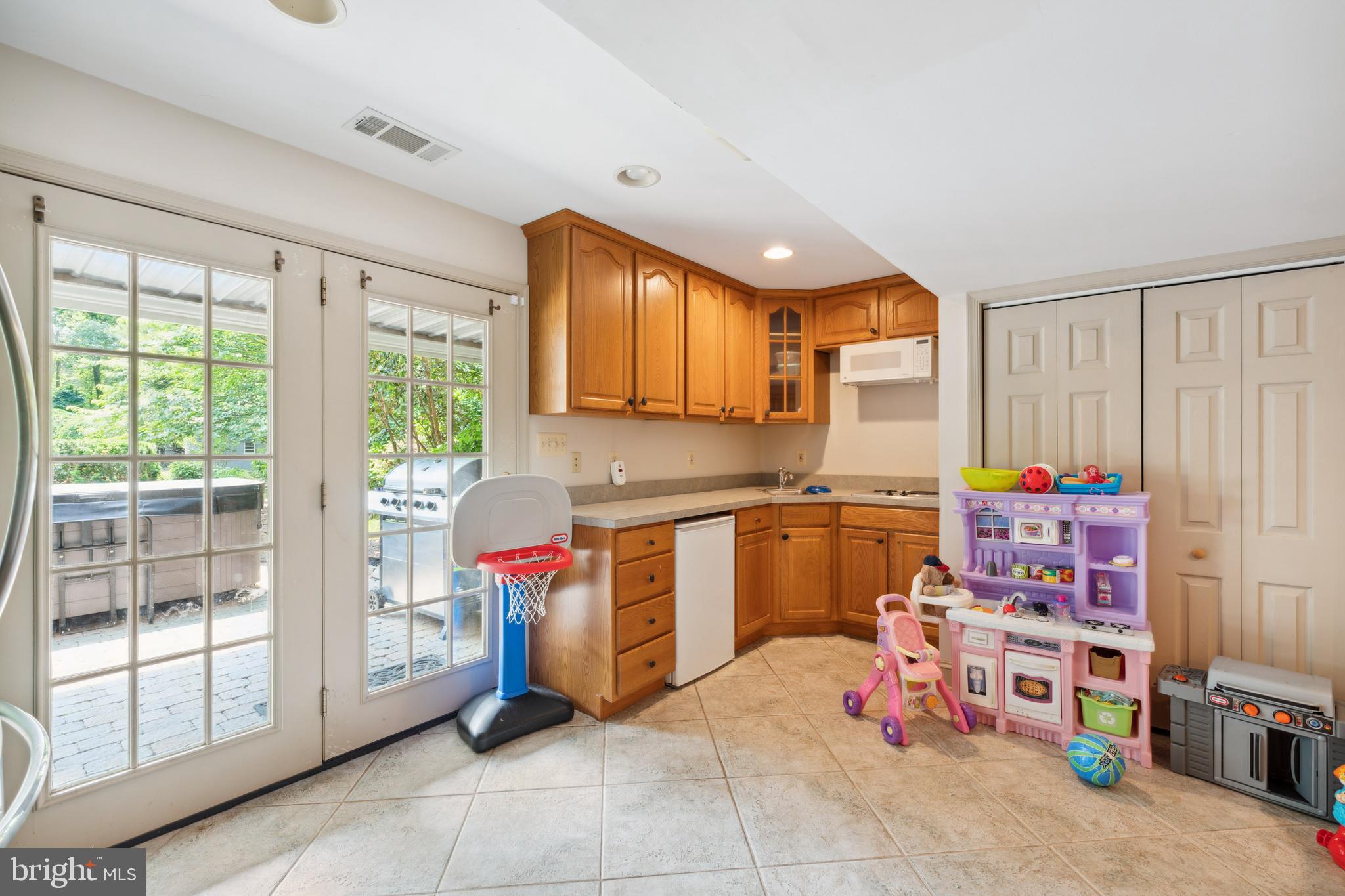 8235 Old Mill Road Pasadena, MD 21122 - Photo 24 of 45 Mult Purpose Room
(Kichenette. Hot tub on Patio