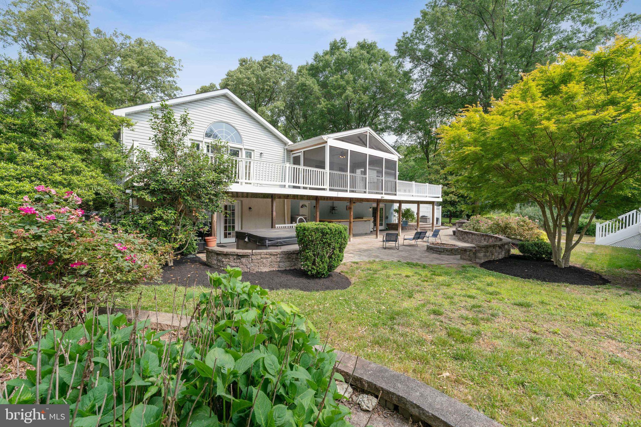 8235 Old Mill Road Pasadena, MD 21122 - Photo 39 of 45 Patio with firepit in distance