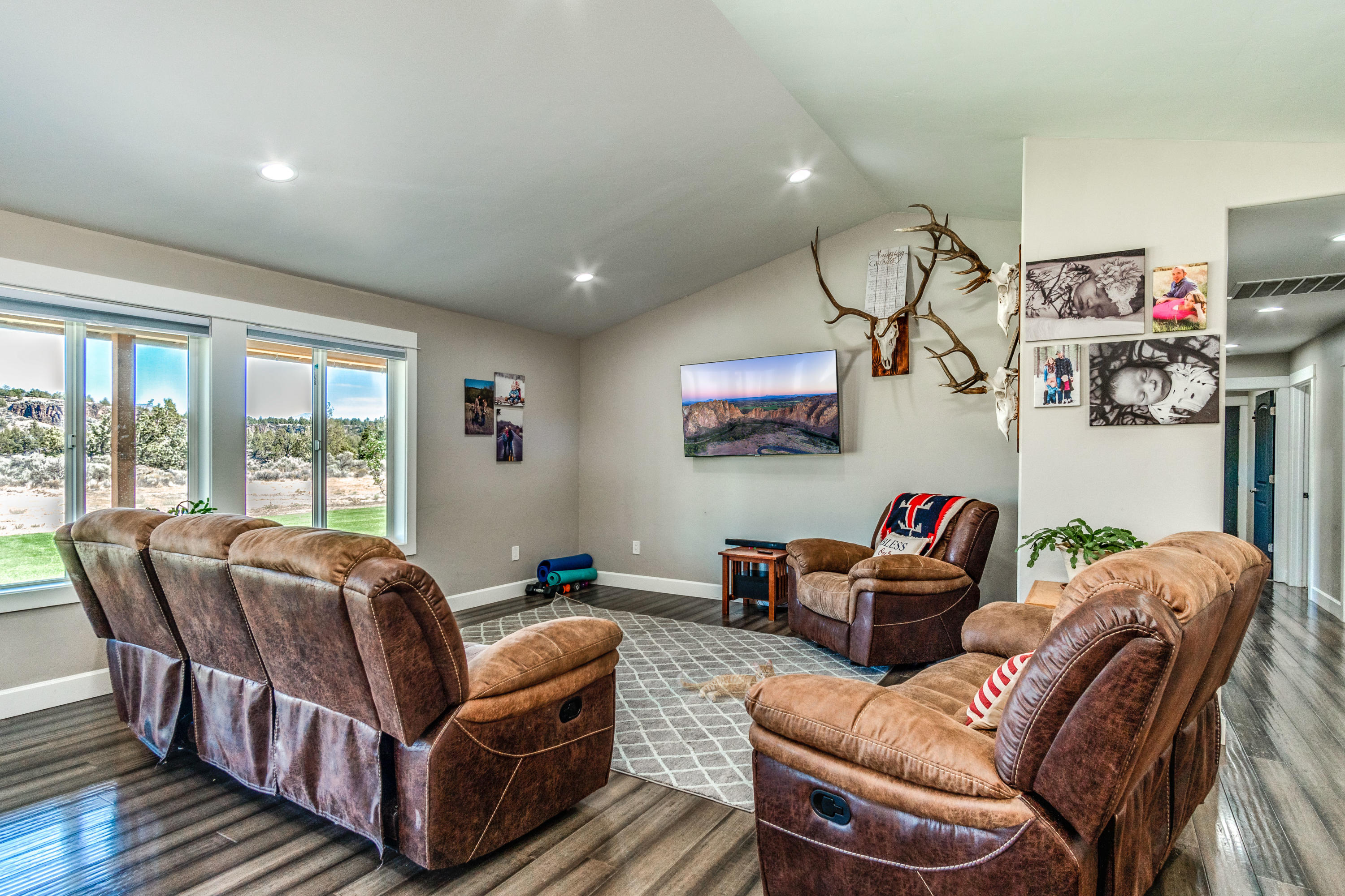4893 Southwest Trout Road Terrebonne, OR 97760 - Photo 9 of 63 Living room with large windows to take in the views.
