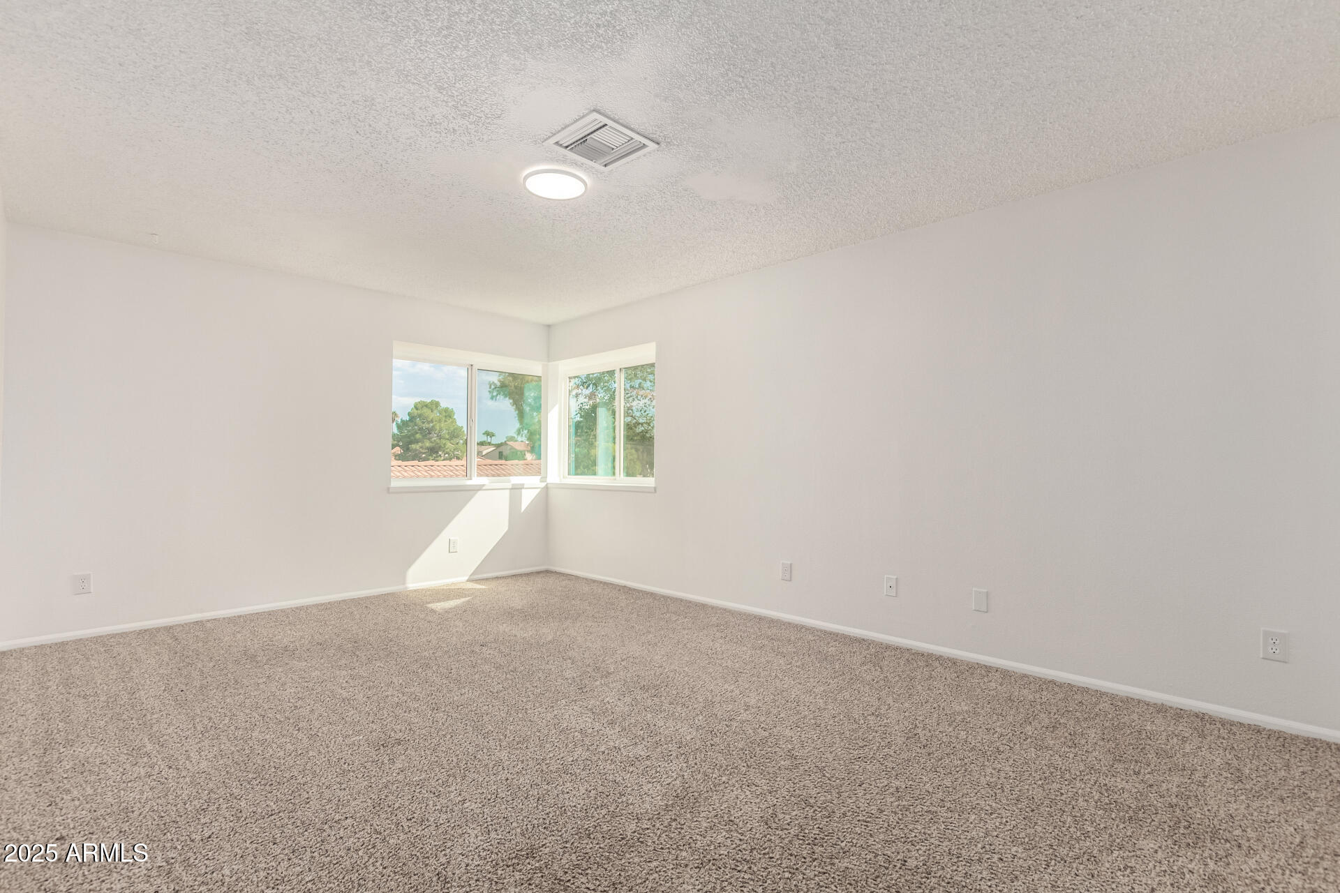 2702 West Brooks Street Chandler, AZ 85224 - Photo 22 of 41 an empty room with windows