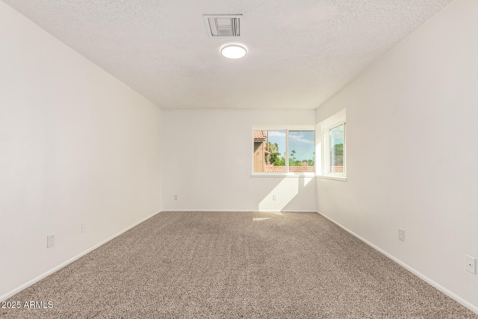 2702 West Brooks Street Chandler, AZ 85224 - Photo 24 of 41 an empty room with windows