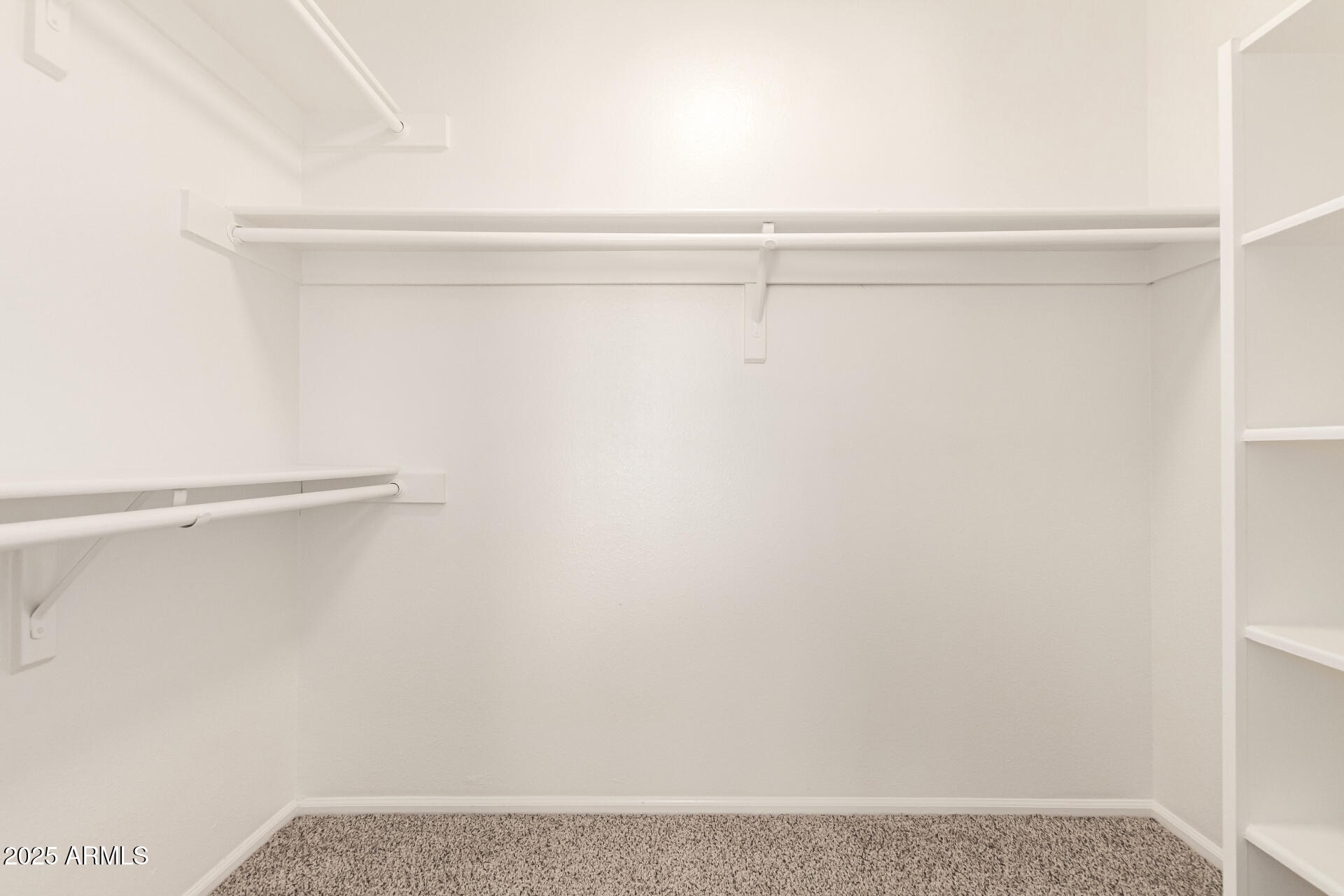 2702 West Brooks Street Chandler, AZ 85224 - Photo 29 of 41 a view of small space with racks on the wall