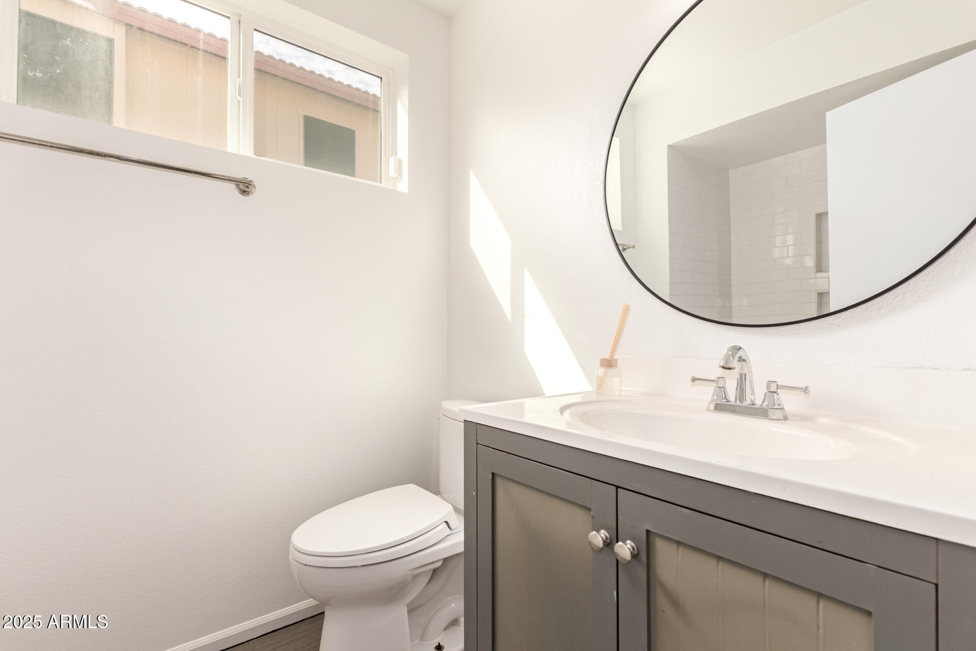 2702 West Brooks Street Chandler, AZ 85224 - Photo 34 of 41 a bathroom with a sink and a mirror