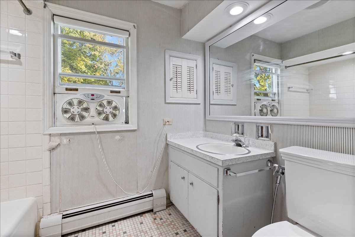 117 Beverly Road Barrington, IL 60010 - Photo 17 of 28 a bathroom with a sink and a mirror