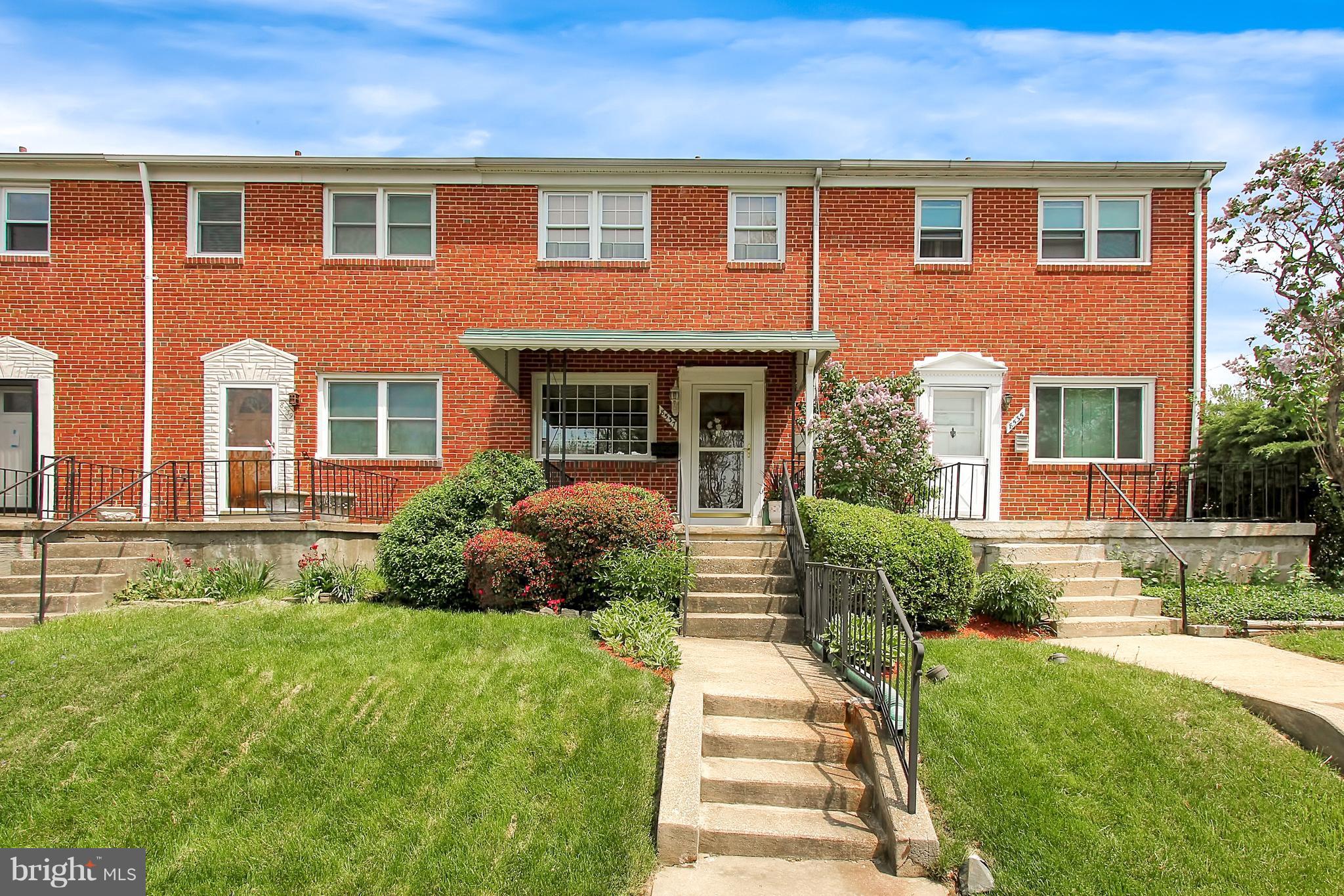 8537 Kings Ridge Road Baltimore, MD 21234 - Photo 1 of 1 a front view of a house with a yard