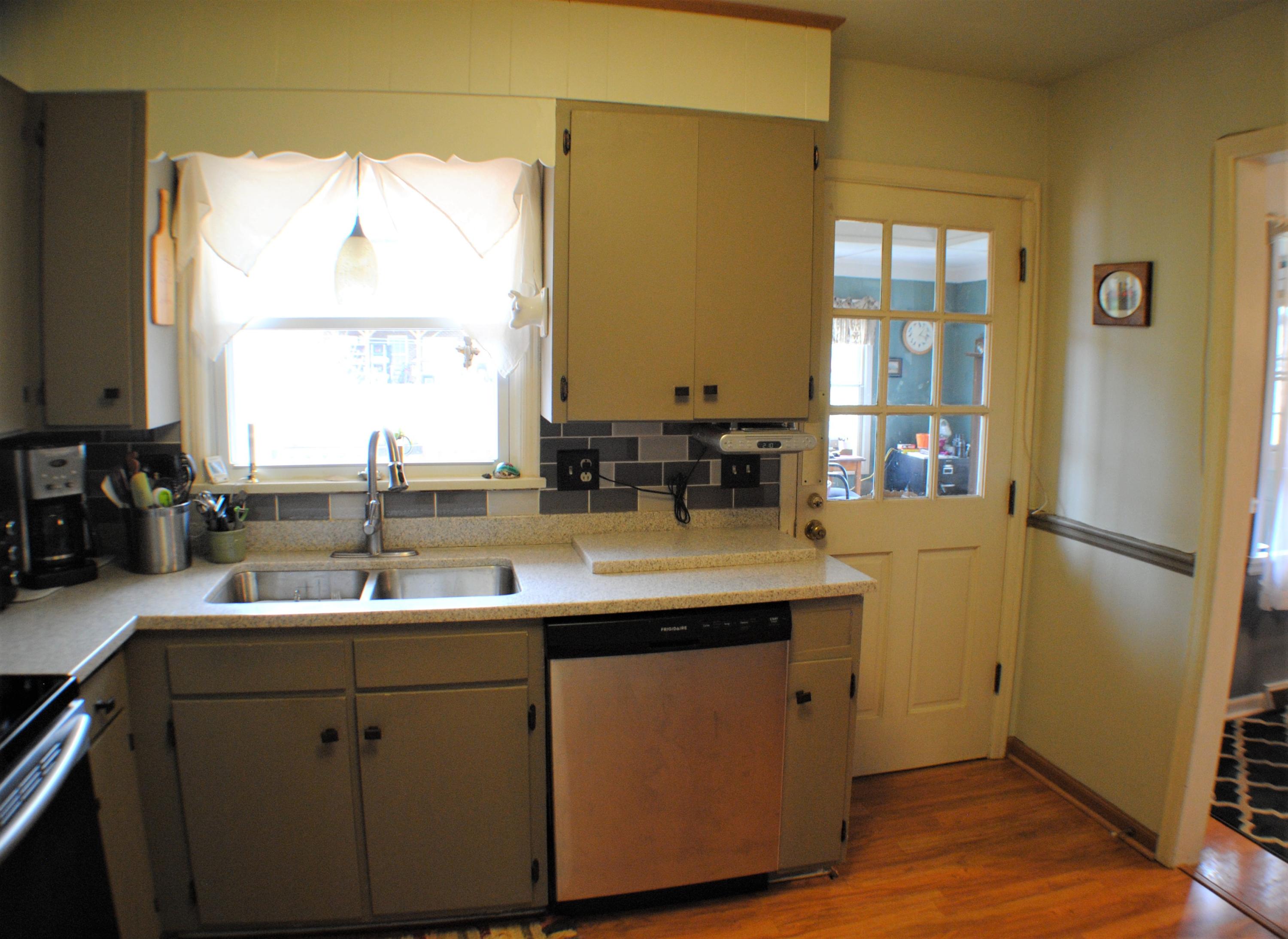 5229 Cave Spring Lane Roanoke, VA 24018 - Photo 11 of 49 a kitchen with a sink and a window