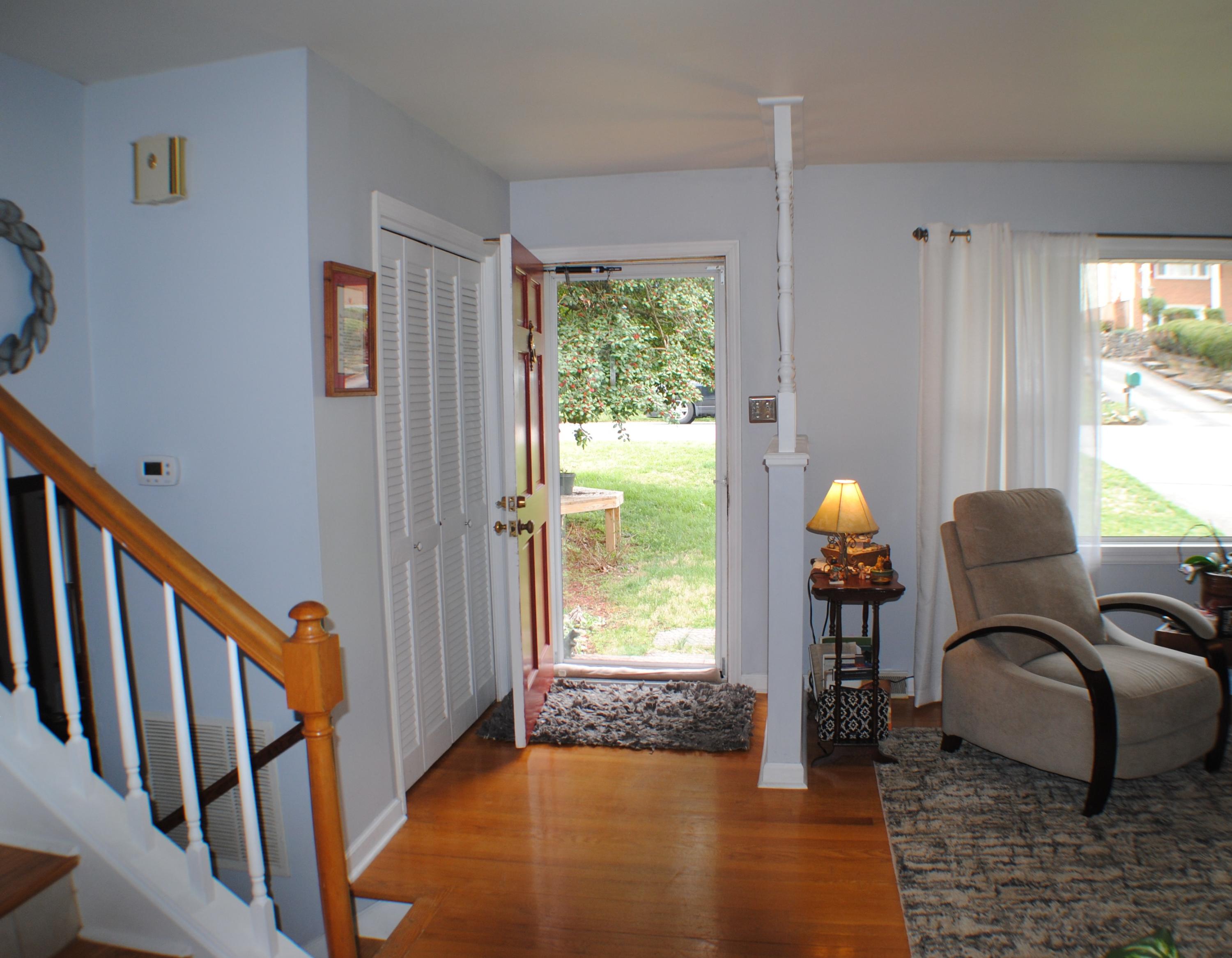 5229 Cave Spring Lane Roanoke, VA 24018 - Photo 3 of 49 a view of a hallway with furniture and a window