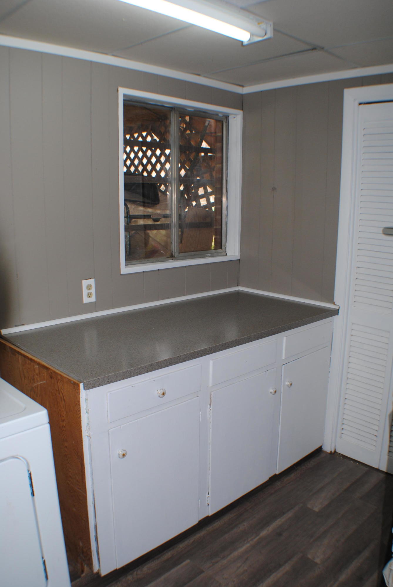5229 Cave Spring Lane Roanoke, VA 24018 - Photo 22 of 49 a kitchen with a white cabinets and window