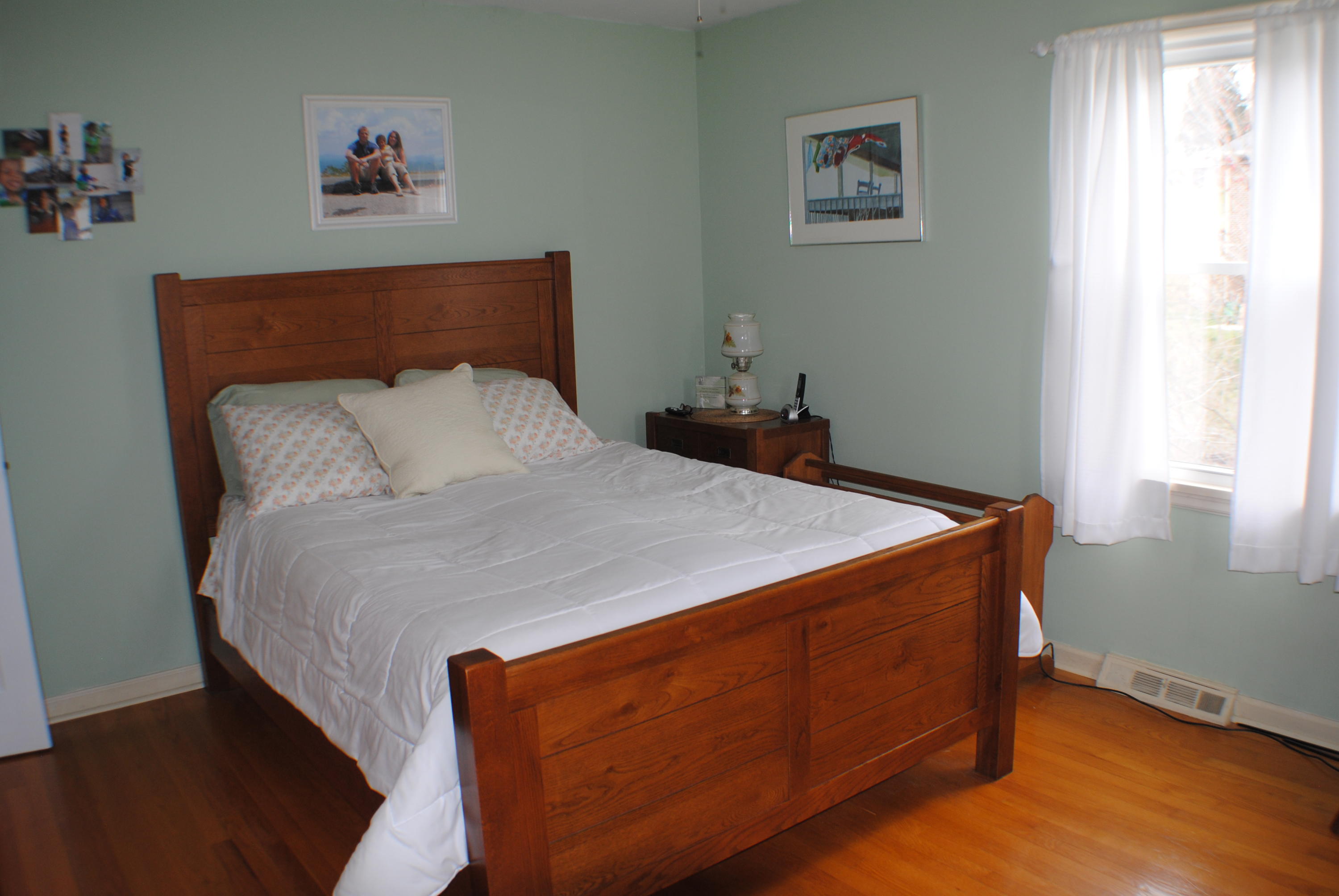 5229 Cave Spring Lane Roanoke, VA 24018 - Photo 29 of 49 a bed sitting in a bedroom next to a window