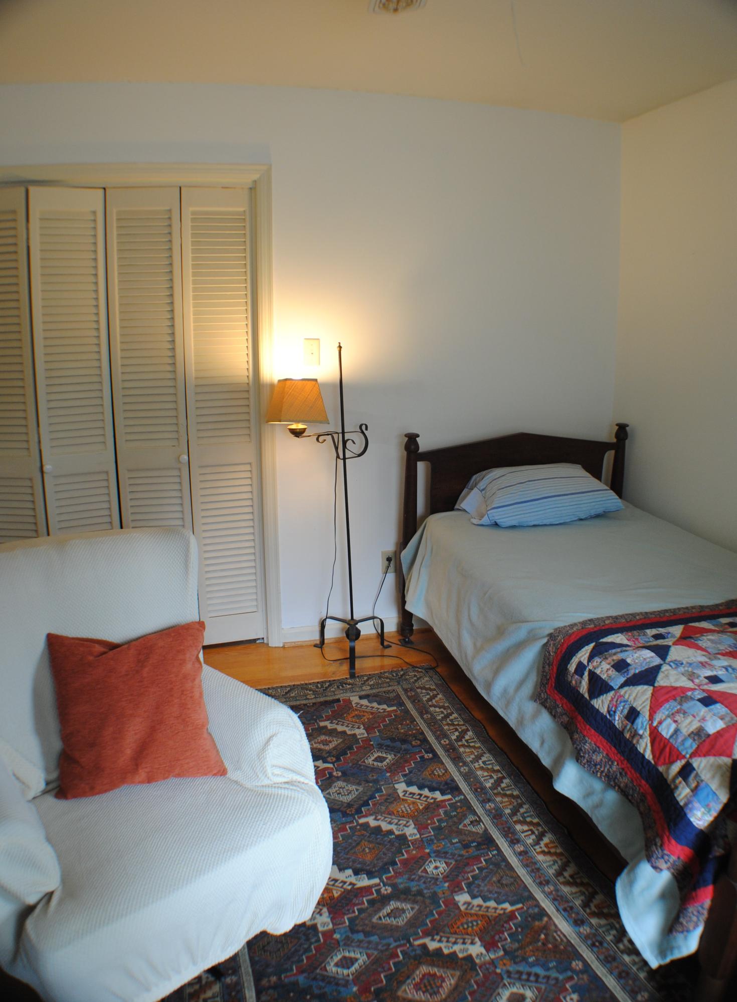 5229 Cave Spring Lane Roanoke, VA 24018 - Photo 31 of 49 a bedroom with a bed and a couch