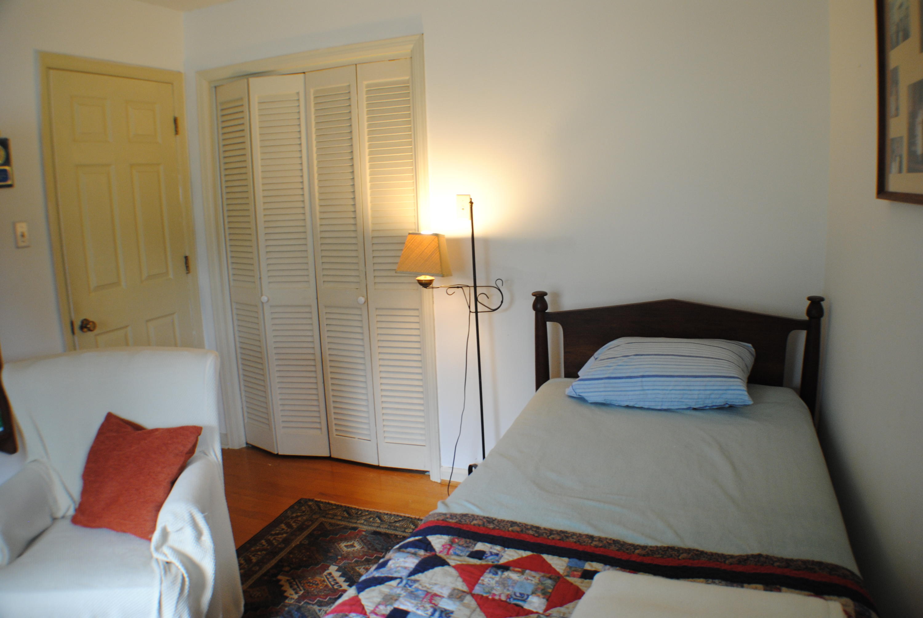 5229 Cave Spring Lane Roanoke, VA 24018 - Photo 32 of 49 a bedroom with a bed and a couch