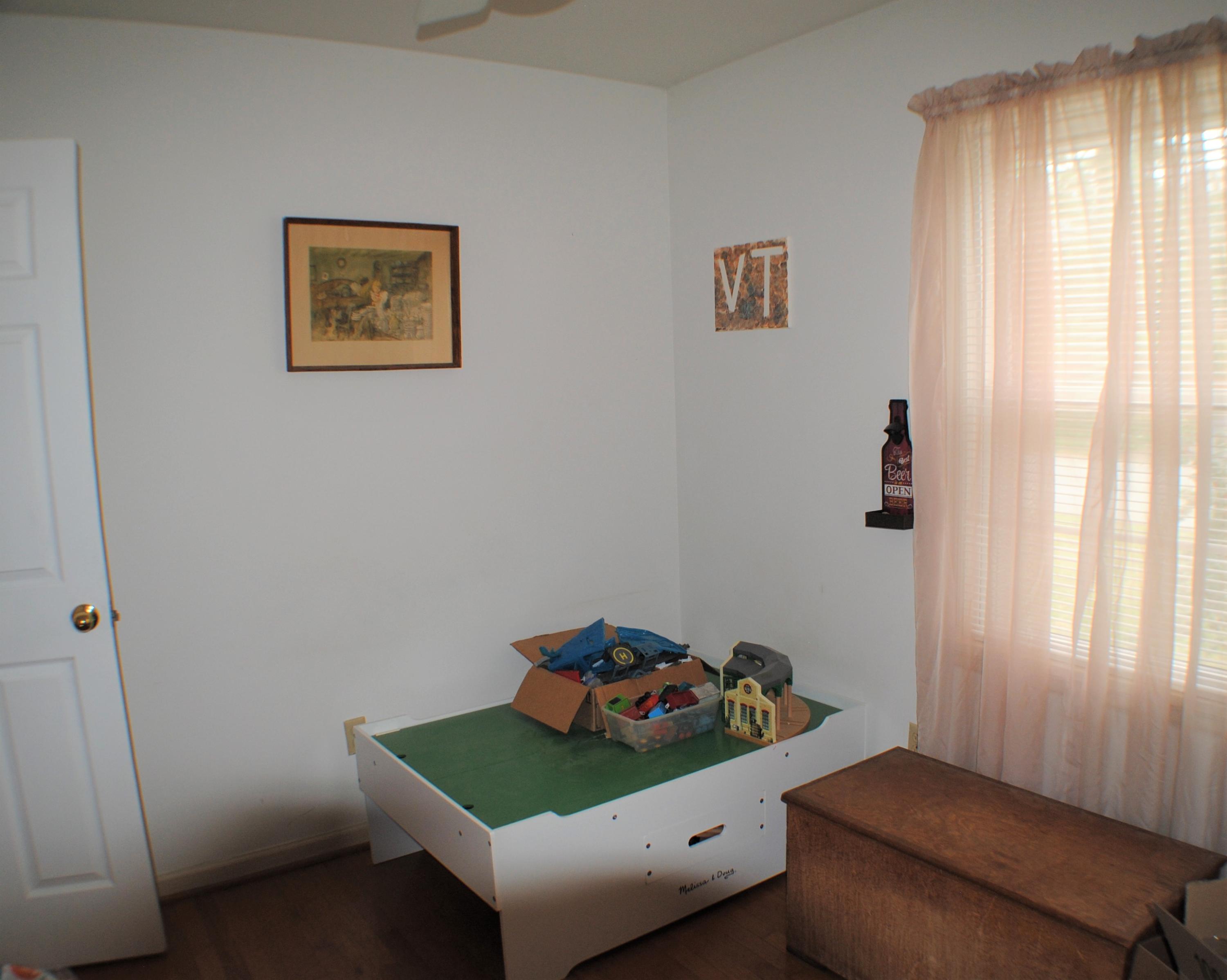 5229 Cave Spring Lane Roanoke, VA 24018 - Photo 34 of 49 a room with furniture and a window