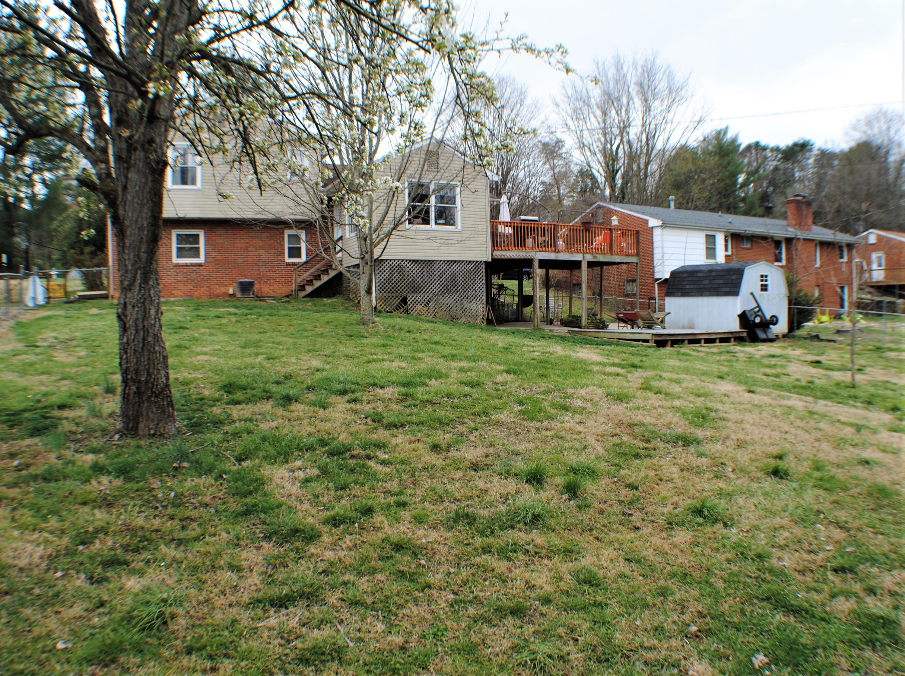 5229 Cave Spring Lane Roanoke, VA 24018 - Photo 40 of 49 a house view with a garden space