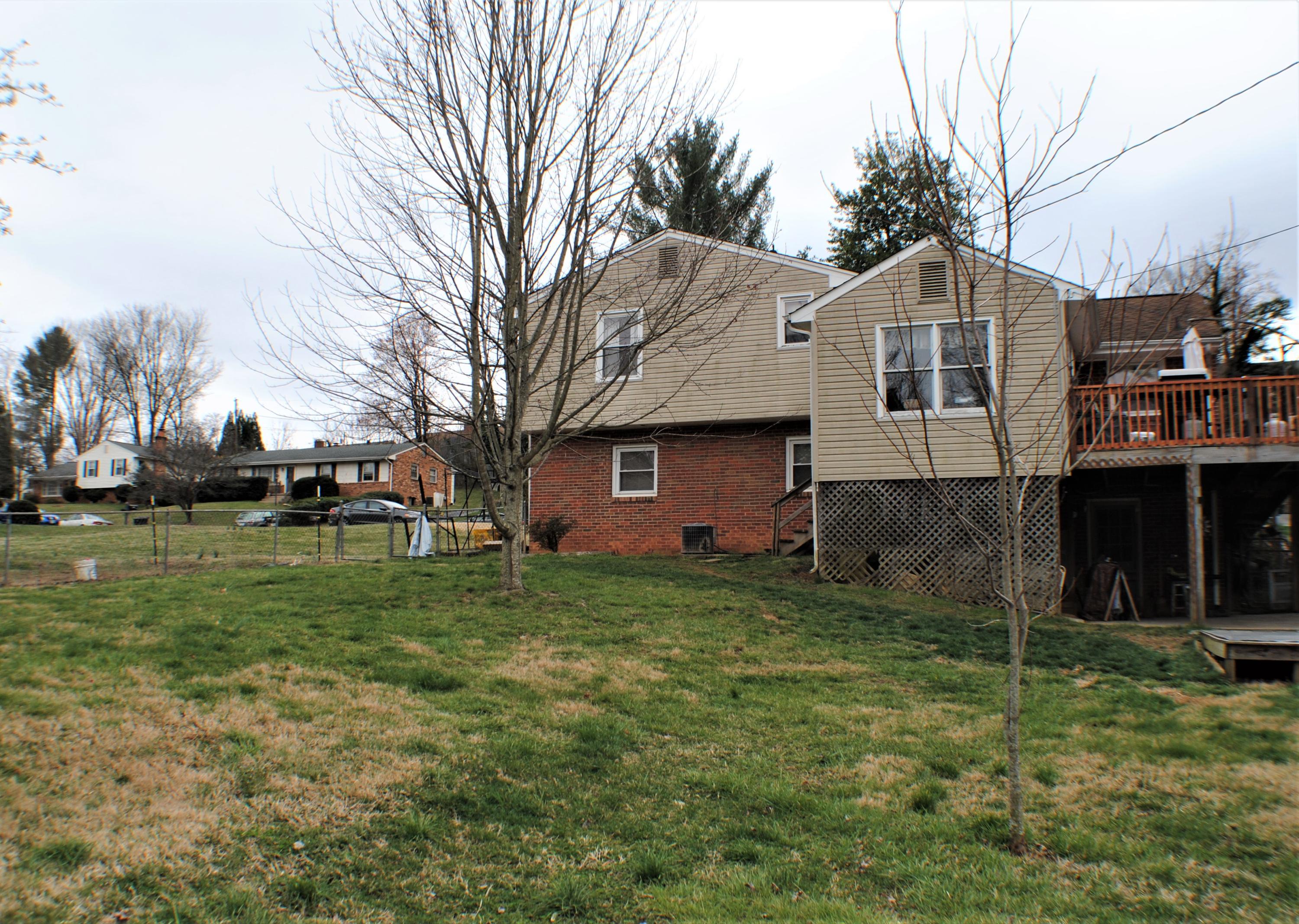 5229 Cave Spring Lane Roanoke, VA 24018 - Photo 41 of 49 a front view of a house with a yard