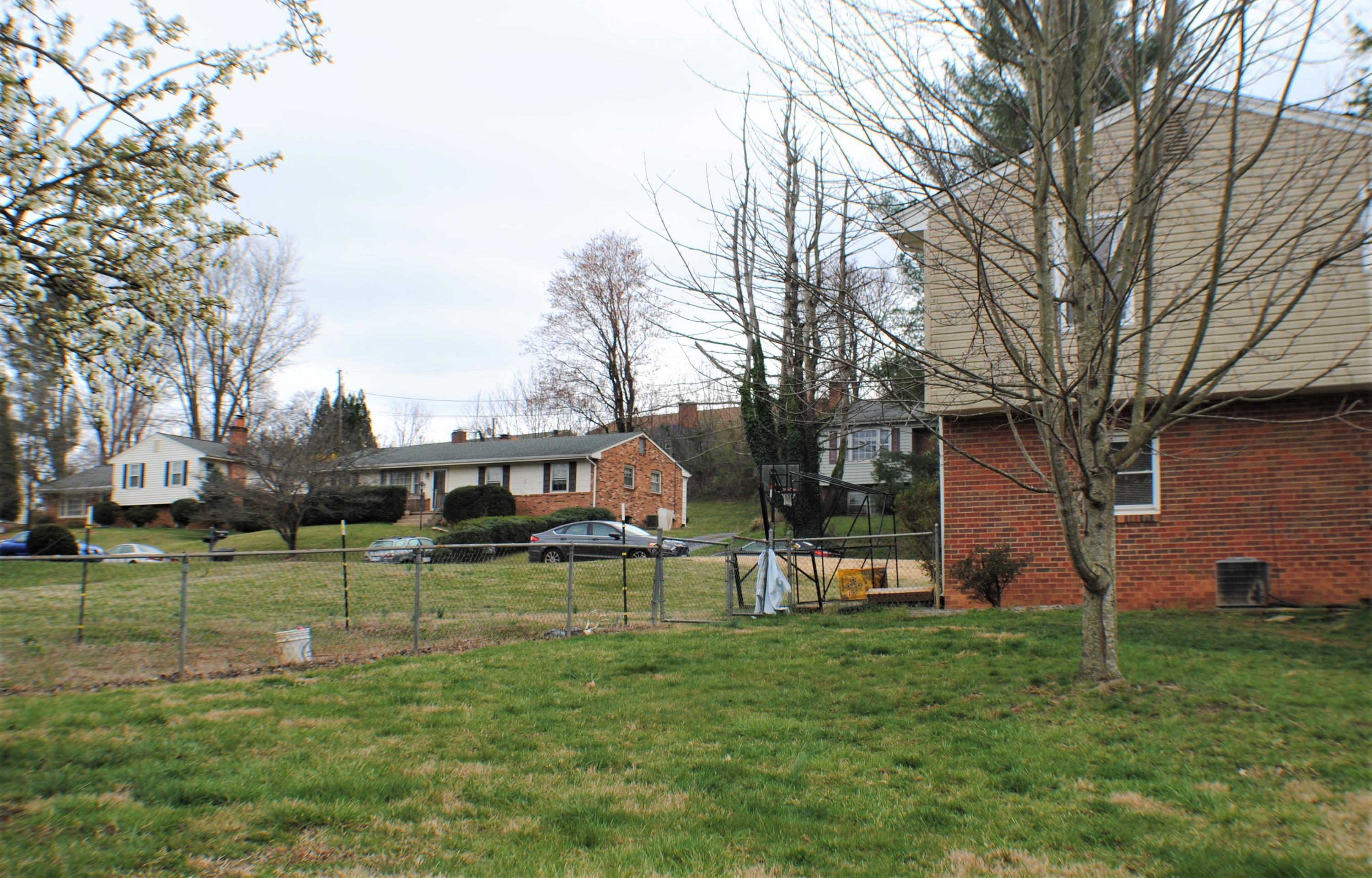 5229 Cave Spring Lane Roanoke, VA 24018 - Photo 42 of 49 a backyard of a house with lots of green space