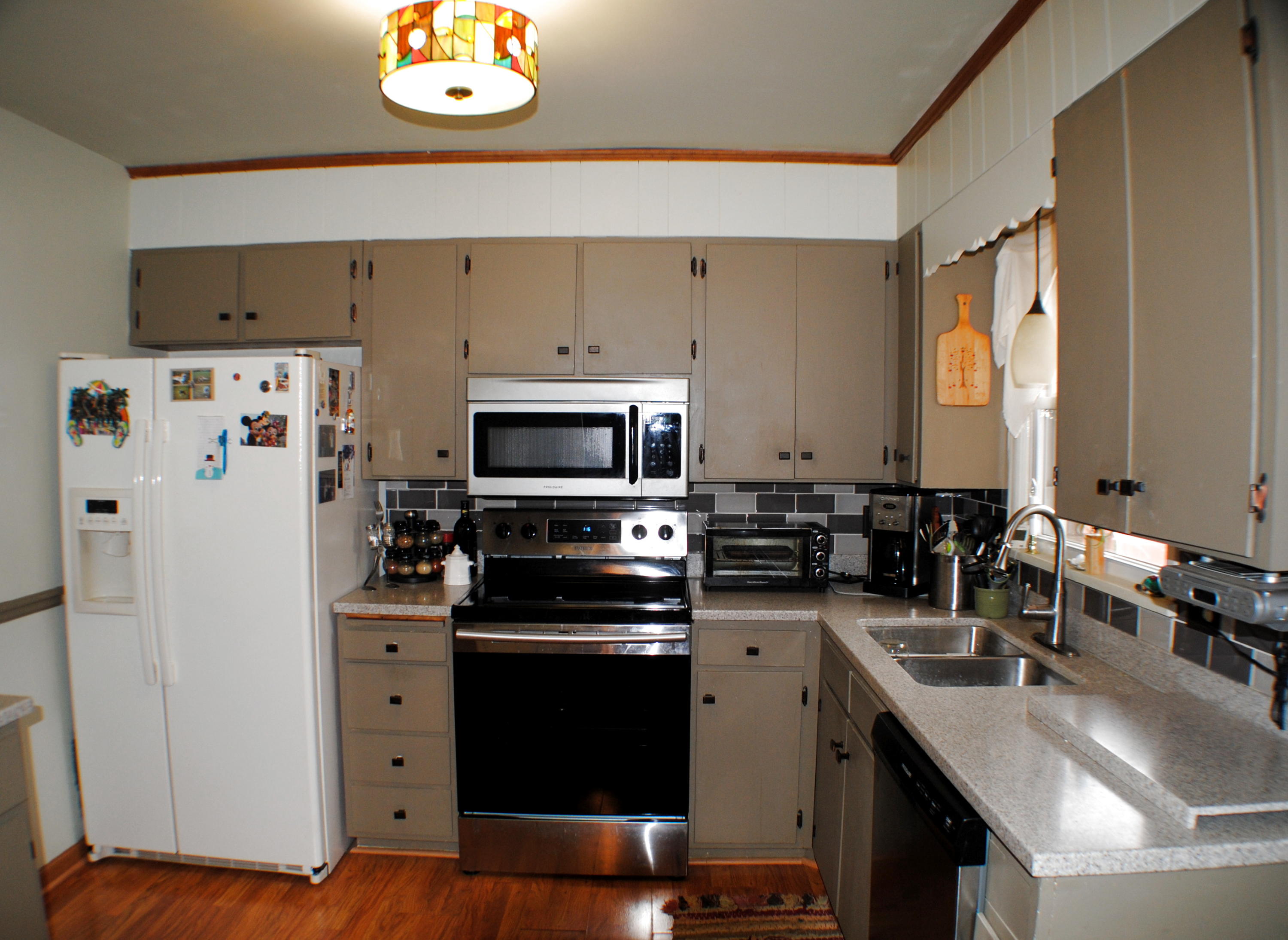 5229 Cave Spring Lane Roanoke, VA 24018 - Photo 8 of 49 a kitchen with stainless steel appliances a stove refrigerator sink and microwave