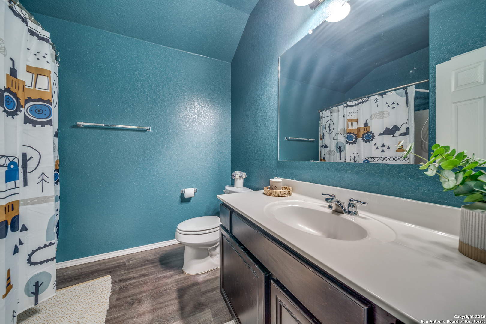7211 Marina Del Rey Converse, TX 78109 - Photo 18 of 25 a bathroom with a sink and a mirror