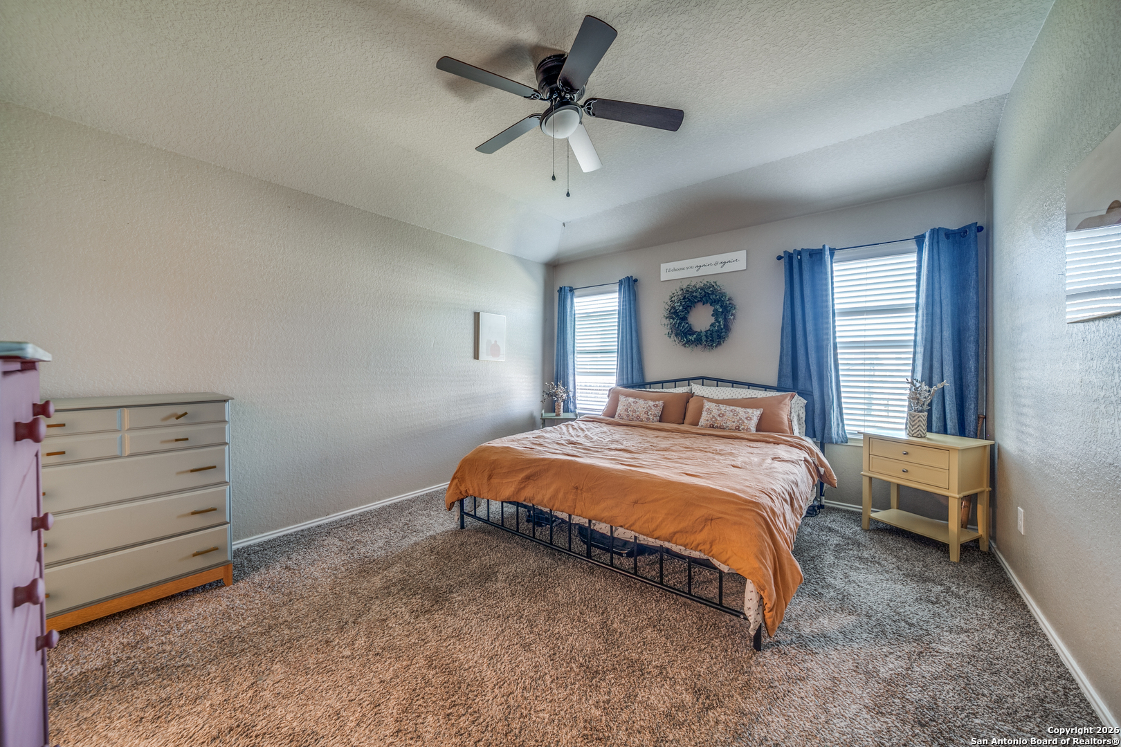 7211 Marina Del Rey Converse, TX 78109 - Photo 20 of 25 a bedroom with a bed and a ceiling fan