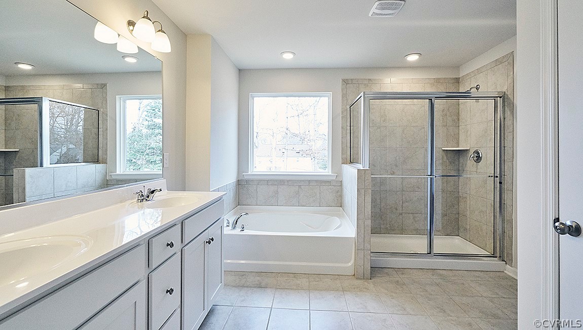 1400 Braisden Road Midlothian, VA 23114 - Photo 13 of 18 a bathroom with a tub sink and a shower