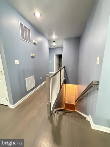 a view of a house with a snow in the yard