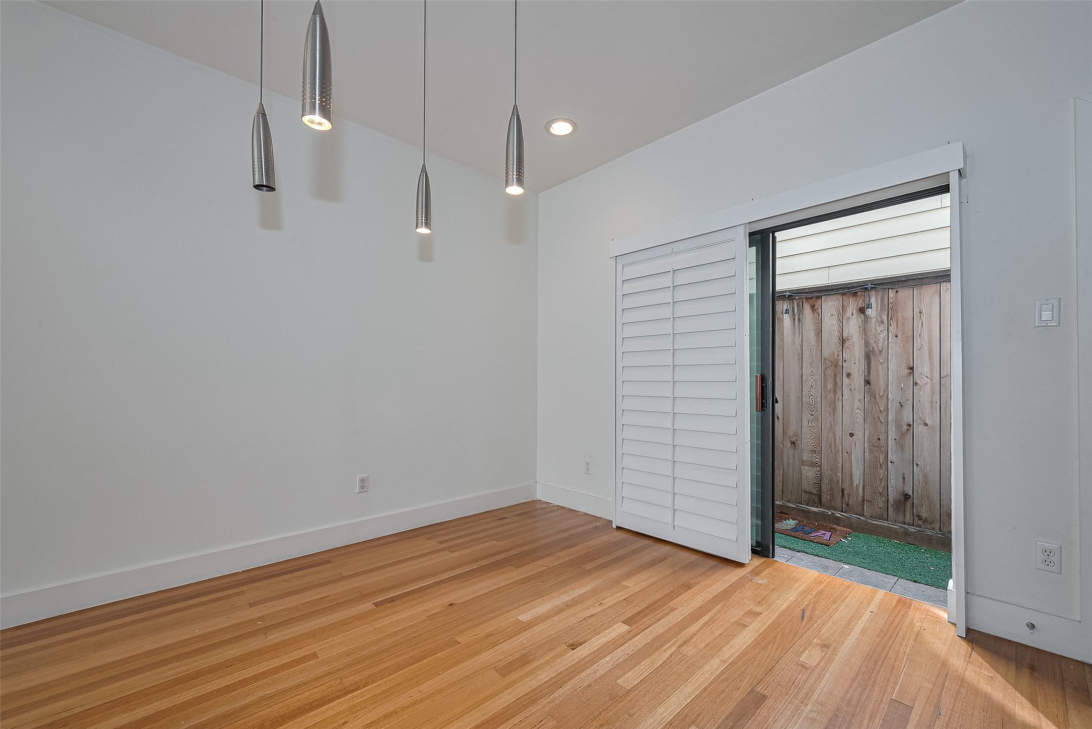 4331 Eigel Street Houston, TX 77007 - Photo 13 of 38 a view of empty room with wooden floor