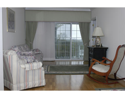 170 Haverhill Street, Unit 138 Andover, MA 01810 - Photo 6 of 16 a living room with furniture and a window