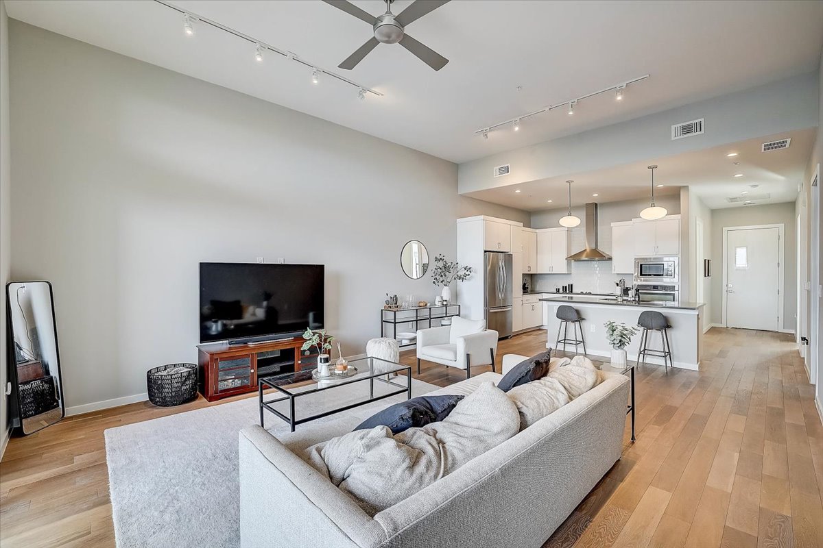 5921 Hiline Road, Unit 1204 Austin, TX 78734 - Photo 5 of 36 Living area featuring ceiling fan, light wood-style flooring, and recessed lighting