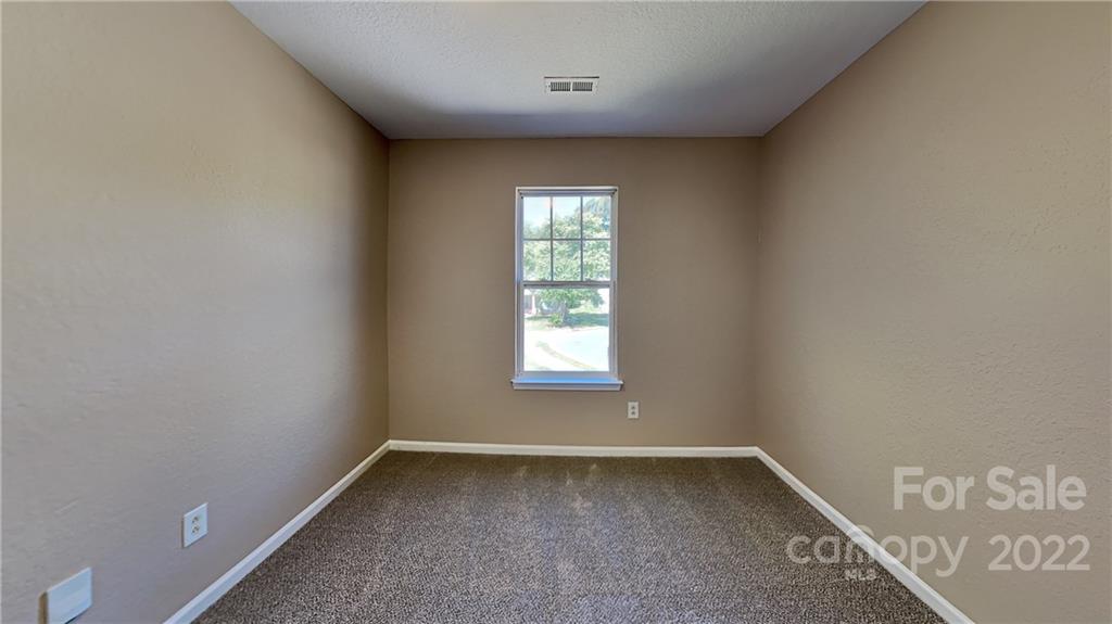 701 Raindrops Road Gastonia, NC 28054 - Photo 5 of 14 a view of a window in an empty room