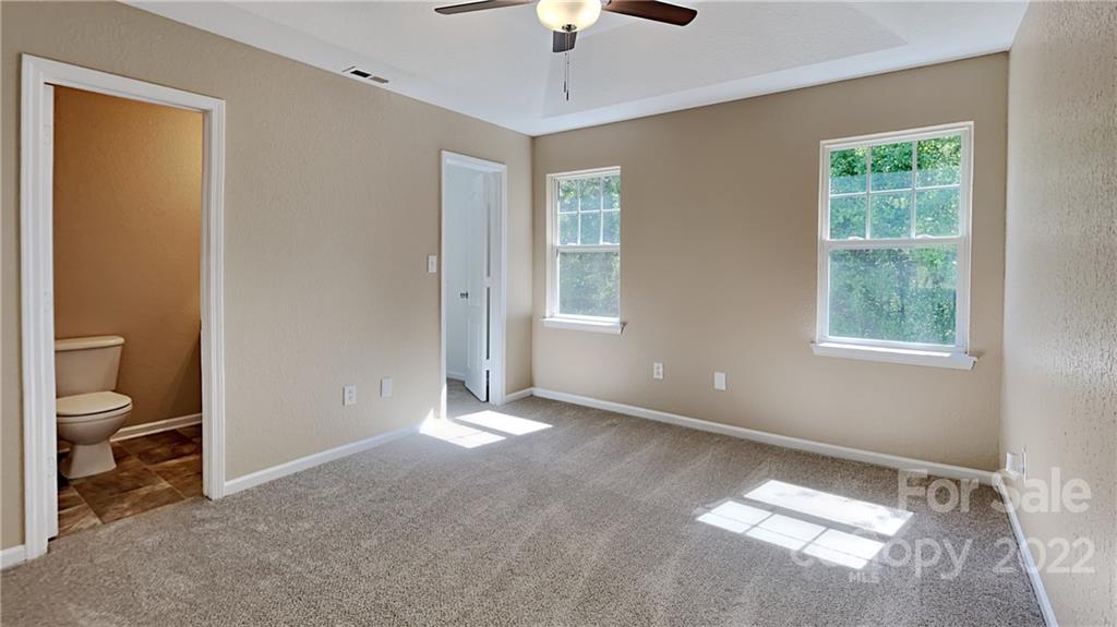 701 Raindrops Road Gastonia, NC 28054 - Photo 9 of 14 a view of an empty room with a window