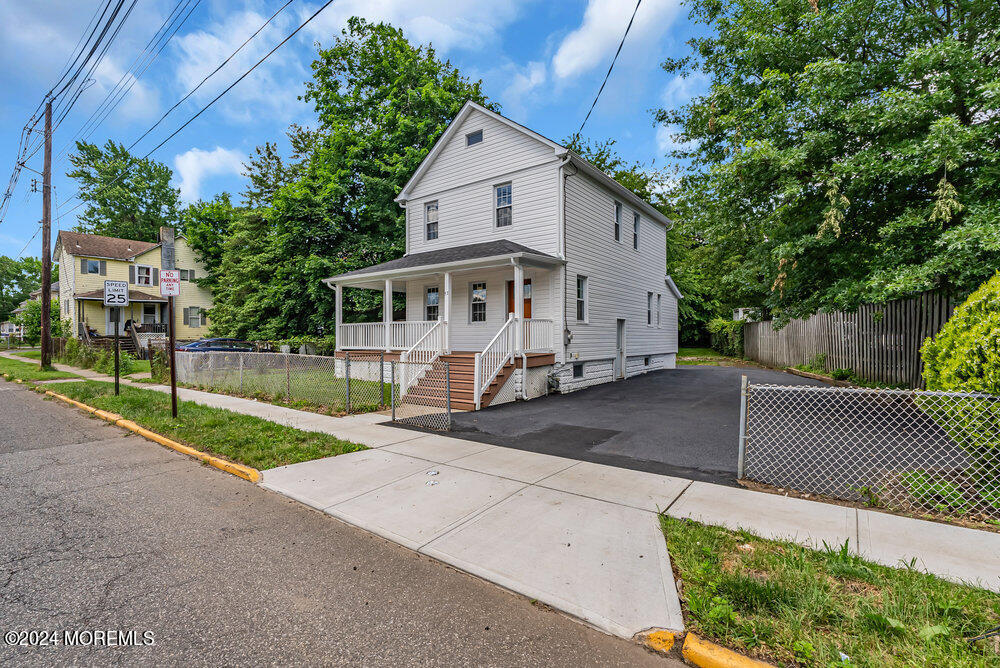 57 Jackson Street Freehold, NJ 07728 - Photo 19 of 48 a house view with a backyard space