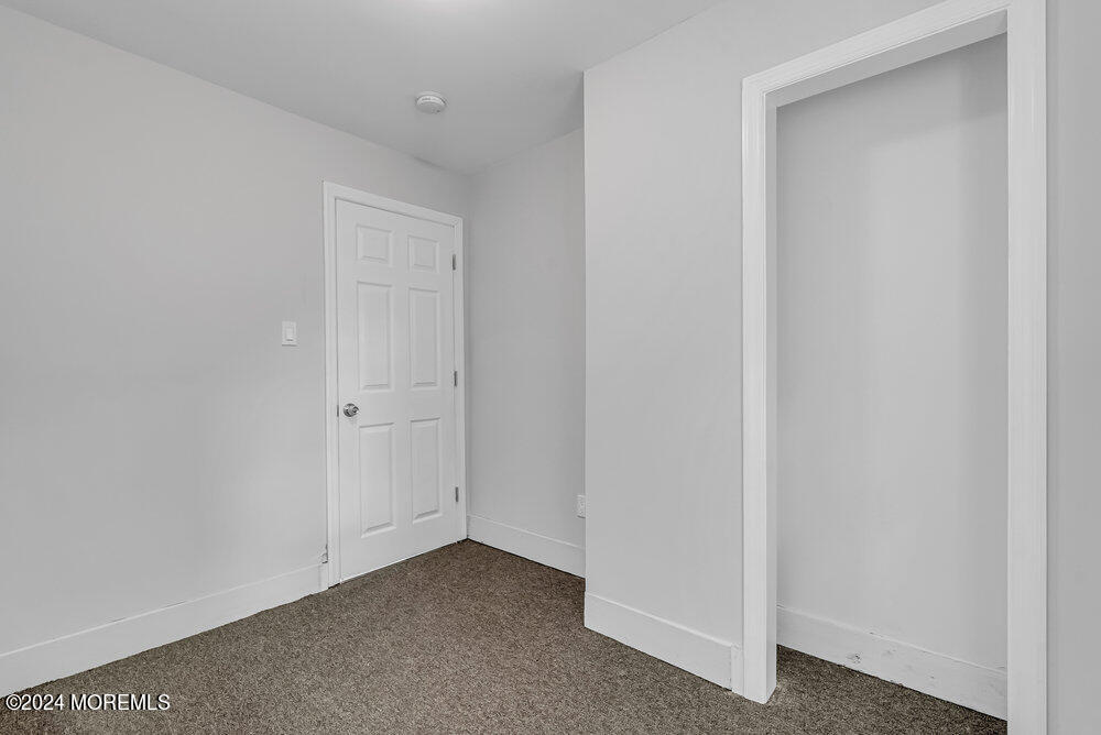 57 Jackson Street Freehold, NJ 07728 - Photo 27 of 48 a view of an empty room