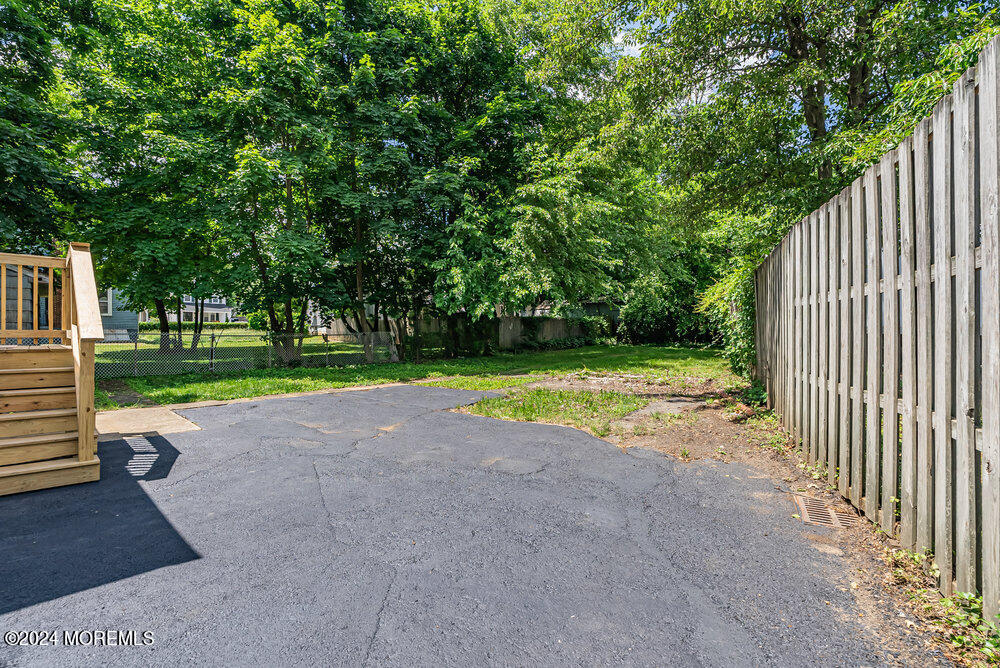 57 Jackson Street Freehold, NJ 07728 - Photo 29 of 48 a view of a house with a yard