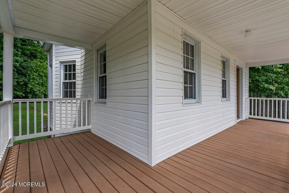 57 Jackson Street Freehold, NJ 07728 - Photo 3 of 48 a view of a wooden deck