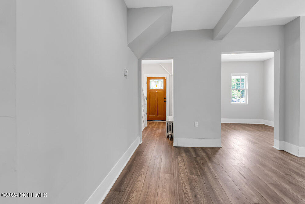 57 Jackson Street Freehold, NJ 07728 - Photo 40 of 48 a view of a room with wooden floor and a window