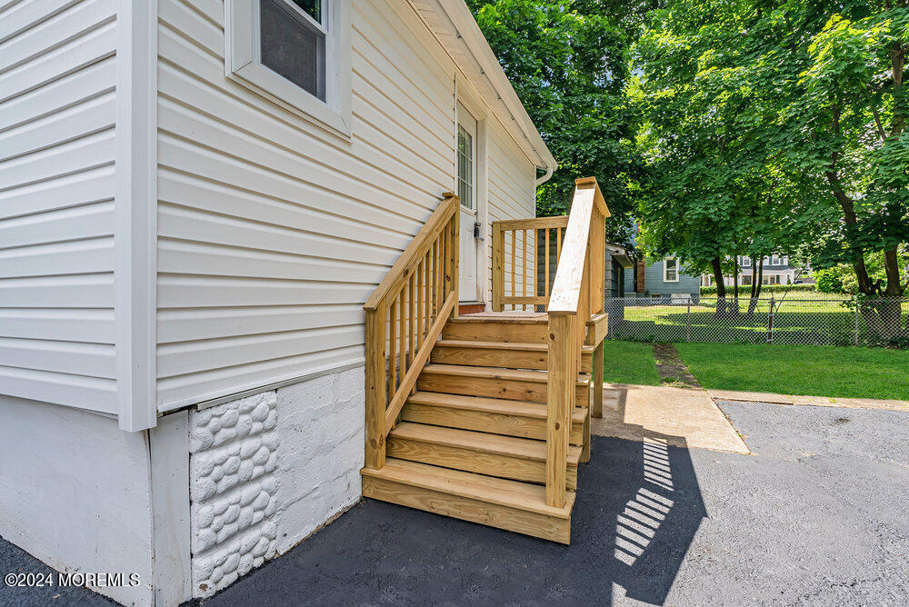 57 Jackson Street Freehold, NJ 07728 - Photo 42 of 48 a view of a house with a yard