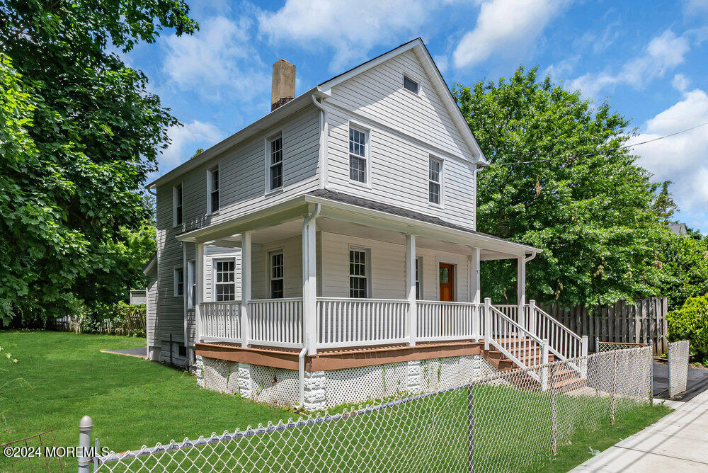 57 Jackson Street Freehold, NJ 07728 - Photo 6 of 48 a view of a house with a yard