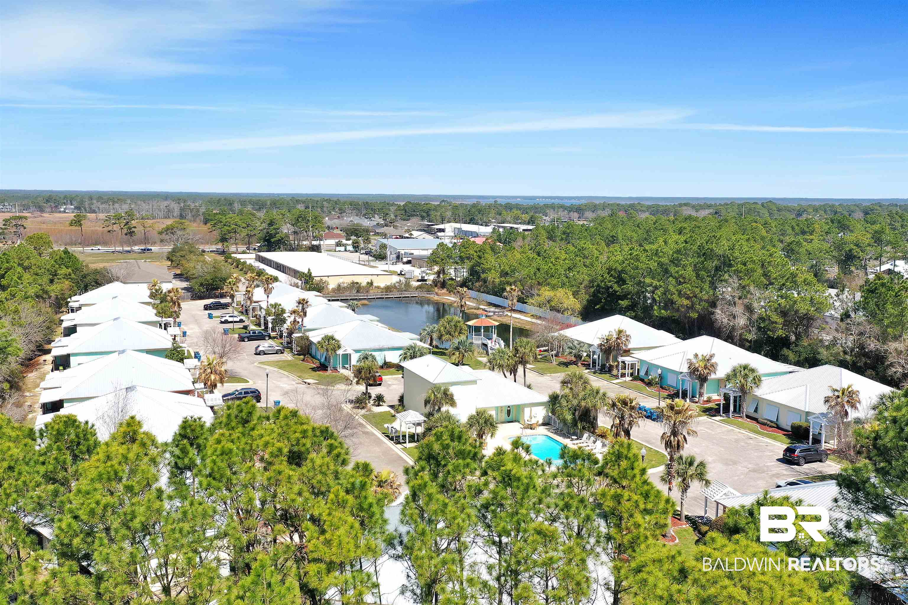 4324 B Lindsey Lane, Unit 4324B Orange Beach, AL 36561 - Photo 31 of 33 Aerial view with a forest view