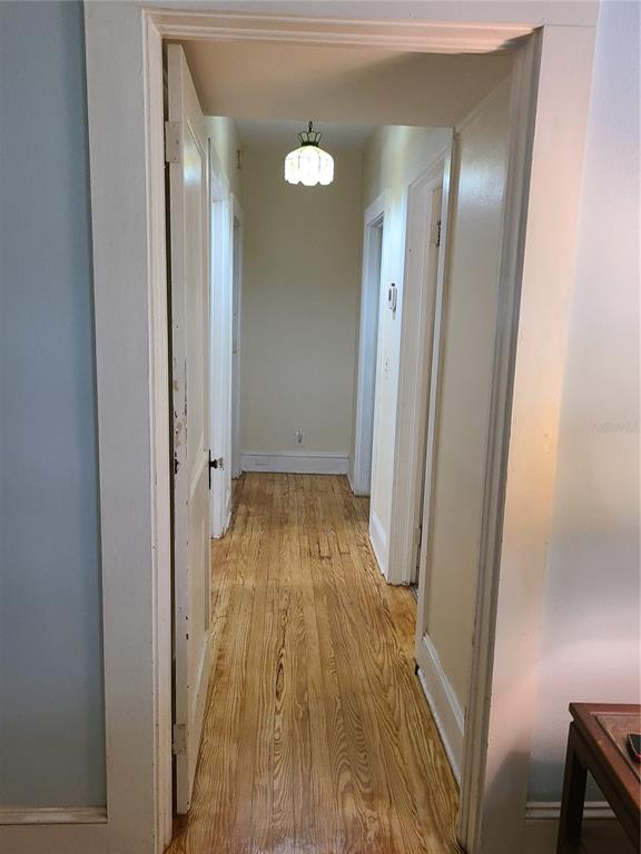 Undisclosed Address High Springs, FL 32643 - Photo 15 of 31 a view of a hallway with wooden floor