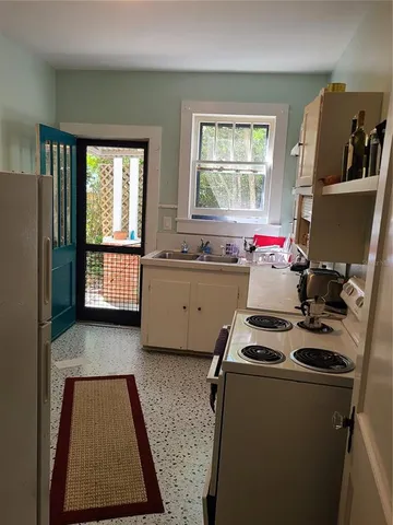 a room with furniture and window