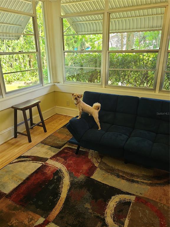Undisclosed Address High Springs, FL 32643 - Photo 2 of 31 a living room with furniture and a large window