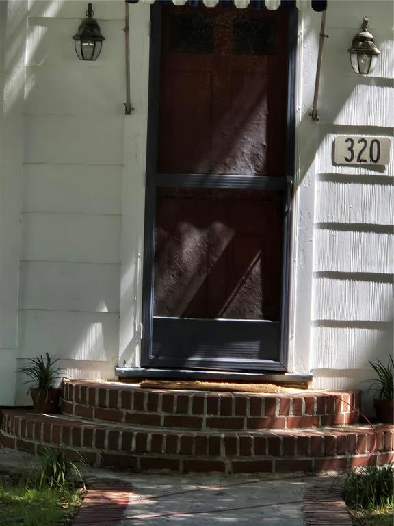 Undisclosed Address High Springs, FL 32643 - Photo 25 of 31 a stove top oven sitting inside of a kitchen