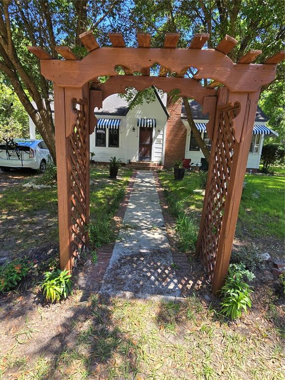 Undisclosed Address High Springs, FL 32643 - Photo 27 of 31 a front view of a house with garden