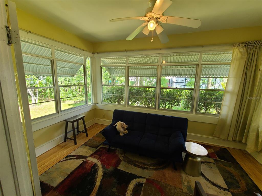 Undisclosed Address High Springs, FL 32643 - Photo 3 of 31 a living room with furniture and a large window