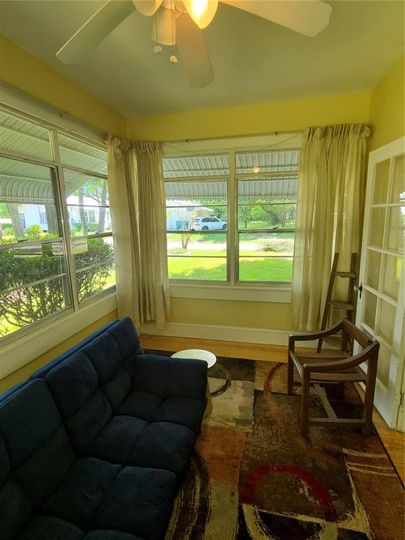 Undisclosed Address High Springs, FL 32643 - Photo 5 of 31 a living room with furniture and a large window