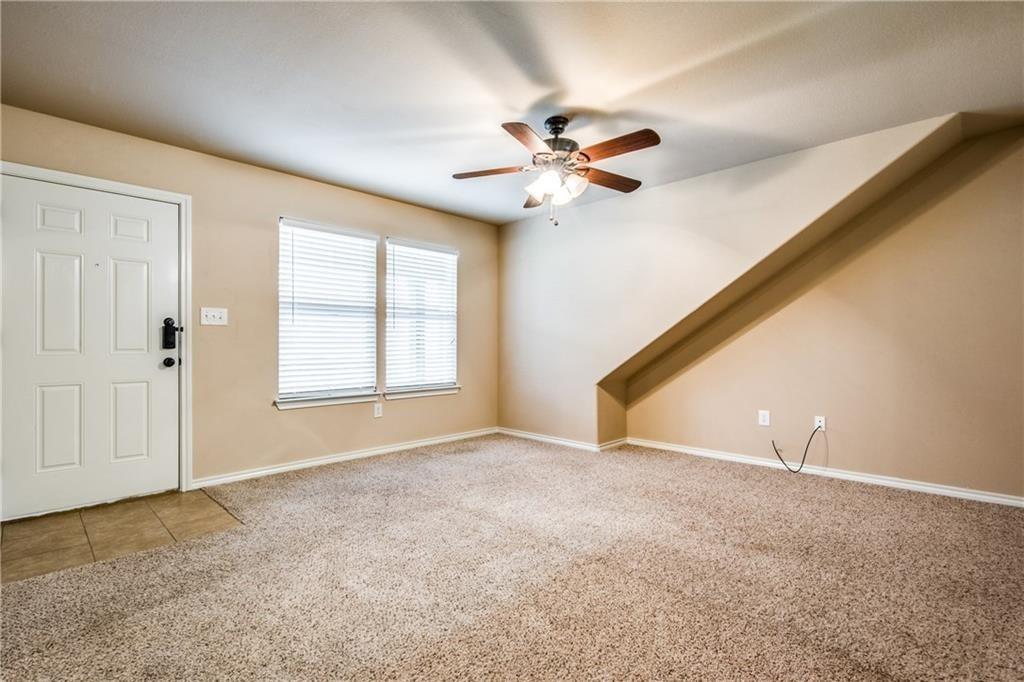 6452 Gregg Road Krum, TX 76249 - Photo 4 of 10 Entryway with light carpet and a ceiling fan