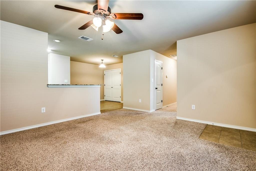 6452 Gregg Road Krum, TX 76249 - Photo 5 of 10 Spare room featuring light carpet and ceiling fan