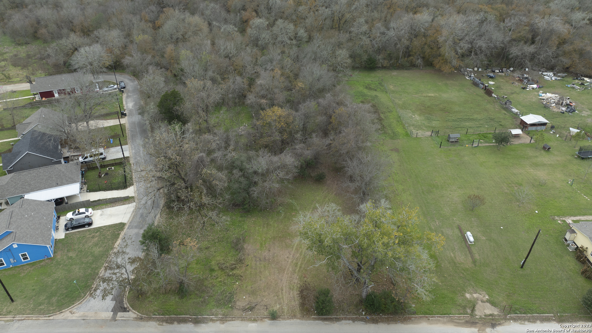 305 Trinity Street Luling, TX 78648 - Photo 6 of 25 a aerial view of a house with a yard